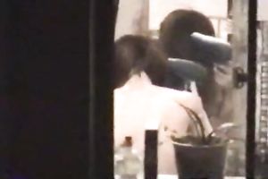 This undressed Asian nympho looks worthy drying her hair