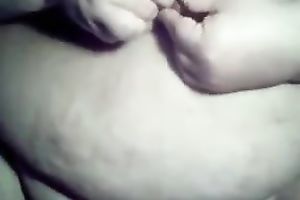 My corpulent bride plays with her nipples and cookie in homemade solo