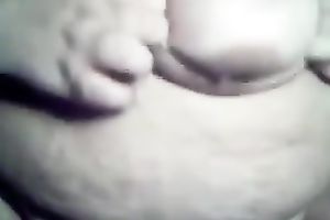 My corpulent bride plays with her nipples and cookie in homemade solo