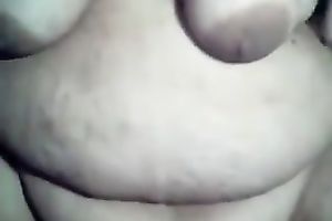 My corpulent bride plays with her nipples and cookie in homemade solo