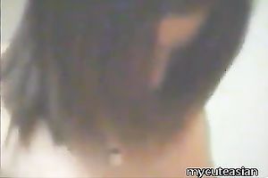 A concupiscent Japanese nympho caught in hidden camera engulfing her lover's dick
