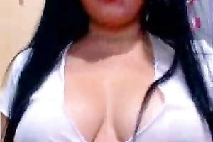 Sexy Latina coed in short petticoat shows off her big boobs