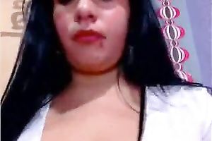 Sexy Latina coed in short petticoat shows off her big boobs