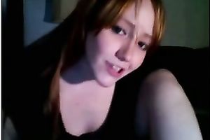 Redhead legal age teenager smashes her snatch with a marital-device on livecam
