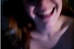 Redhead legal age teenager smashes her snatch with a marital-device on livecam