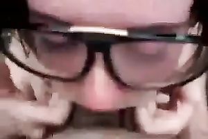 Nerdy girl is engulfing on my rod with all the excitement this babe has