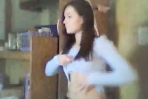 Sexy dilettante hottie moves seductively during the time that stripping on camera