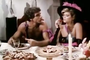 Five youthful couples beginning a group sex at the dinner table