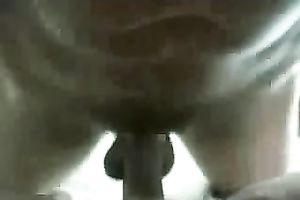 Penetrating her soaked and itchy muff with a cock rubber on the couch