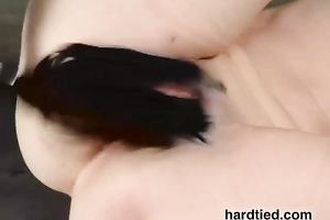 Bound hussy receives her bald twat beaten in BDSM movie scene