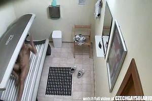 Weird brunette hair guy jerks off his dick during tanning