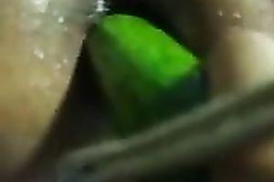 My paramour enjoys fucking my cunt with a cucumber in homemade episode