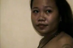 Amateur Thai milf takes her pants off and rubs her unshaved fur pie