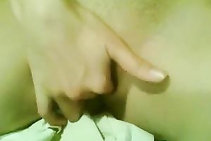 Buxom legal age teenager with pierced teats is finger fucking her cookie like a pro