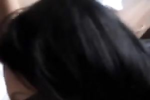 Two sexy masked brunettes engulf my cock in advance of taking it in their snatches
