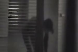 Magnificent wife living next building walks undressed in her apartment