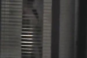 Magnificent wife living next building walks undressed in her apartment