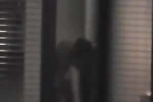 Magnificent wife living next building walks undressed in her apartment