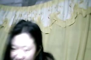 Thai floozy shows off her pantoons, vagina and butt on web camera
