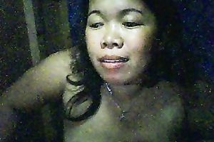 Chubby Filipina doxy shows her scones and fingers her shaved pussy