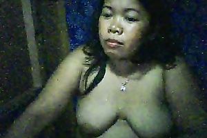 Chubby Filipina doxy shows her scones and fingers her shaved pussy