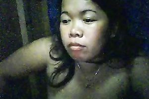 Chubby Filipina doxy shows her scones and fingers her shaved pussy