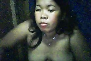 Chubby Filipina doxy shows her scones and fingers her shaved pussy
