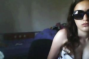 Hot camgirl with sunglasses flashes her large boobies