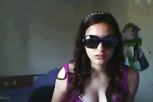 Hot camgirl with sunglasses flashes her large boobies