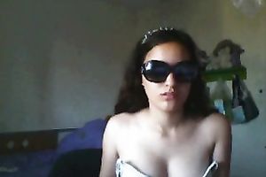 Hot camgirl with sunglasses flashes her large boobies