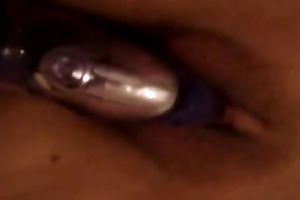 Japanese milf groans sweetly whilst getting her love tunnel toyed