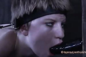 Short haired sweetheart bounded on a skateboard sucks a sex tool