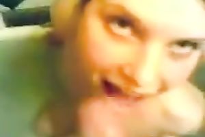 Brown-haired honey enjoys engulfing 2 boners in the bath