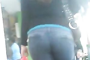 Spy web camera vid with a big-assed gal wearing jeans walking down the street
