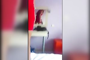 My doxy acquires ready to go out by putting on nylons and high heel shoes