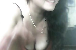 Webcam solo with a curvy brunette hair milf flashing her astounding cleavage