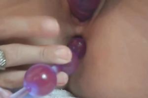 Uncontrollably lewd playgirl copulates with a sex tool in her booty