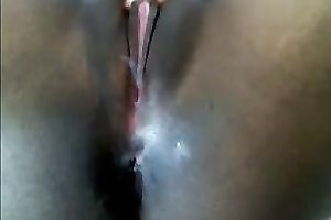 Black chick is rubbing her bald snatch like there's no the next day