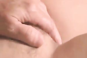 My sexy paramour fingers her snatch and kneads her scones on the couch