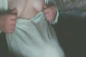 My aged co-worker plays with her cum-hole in front of a cam