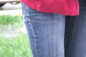 Tanya changes her clothing after pissing her jeans outdoors