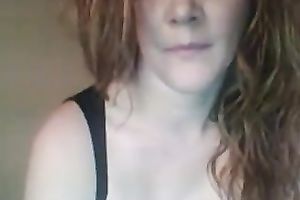 Bosomy redhead fingers her cookie in hardcore cam solo