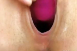 Mind-blowingly hawt web camera model bonks herself with her dildo