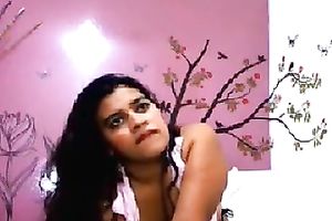 Chubby exotic hottie shows her love muffins and arse for the web camera