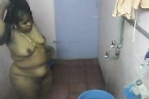 Indian fattie disrobes and takes a shower in hidden livecam video