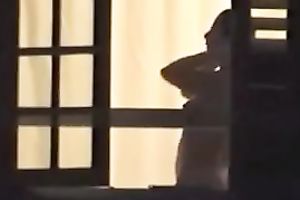 Spying on my priceless looking neighbour with merry wobblers showering