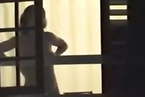 Spying on my priceless looking neighbour with merry wobblers showering