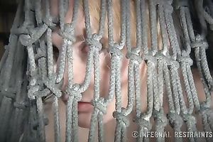 Slender blondie with pale skin bounded with net restrained by her mentor