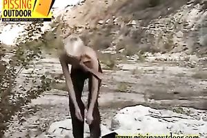 Skinny blondie with long legs acquires stripped to pee outdoors