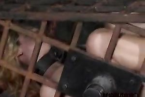 Sexy golden-haired thrall with great slender body is bounded in cage